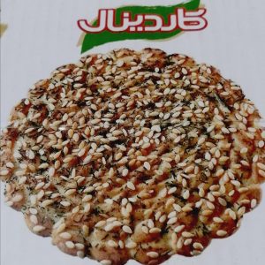 بیسکوییت حاوی آرد جو کاردینال باطعم هل وتزیین کنجد و شوید